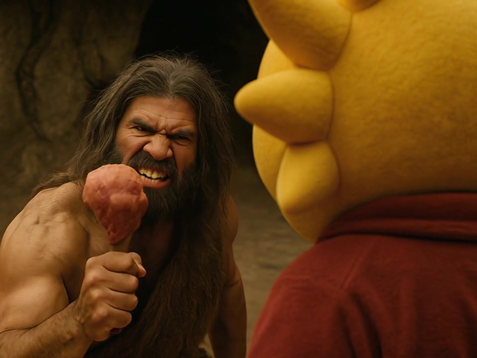 A caveman holds a piece of meat while confronting Marty