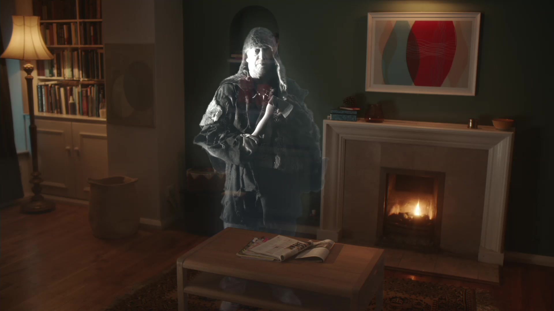 Sarah — a ghostly figure appears beside the living-room fireplace