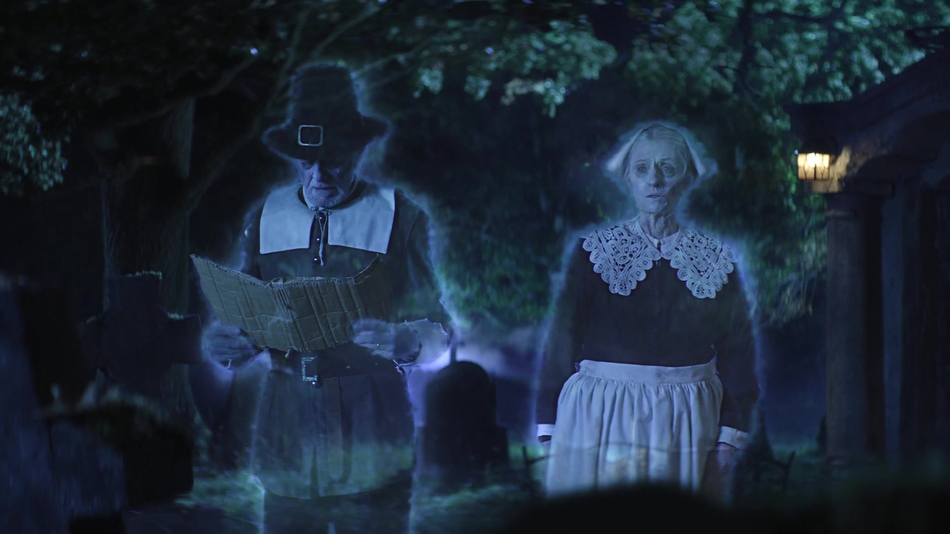 Garage Sale — Blue glowing ghost couple in colonial clothes reading a paper