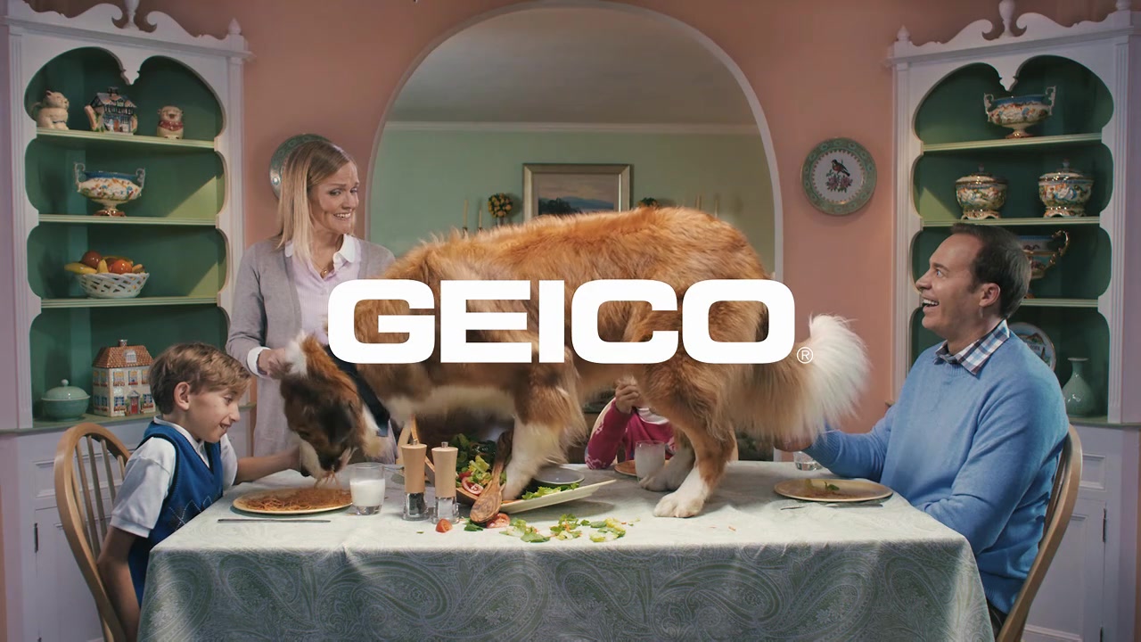 Family — the dog stands on the dinner table, eating the spaghetti while the family stays frozen